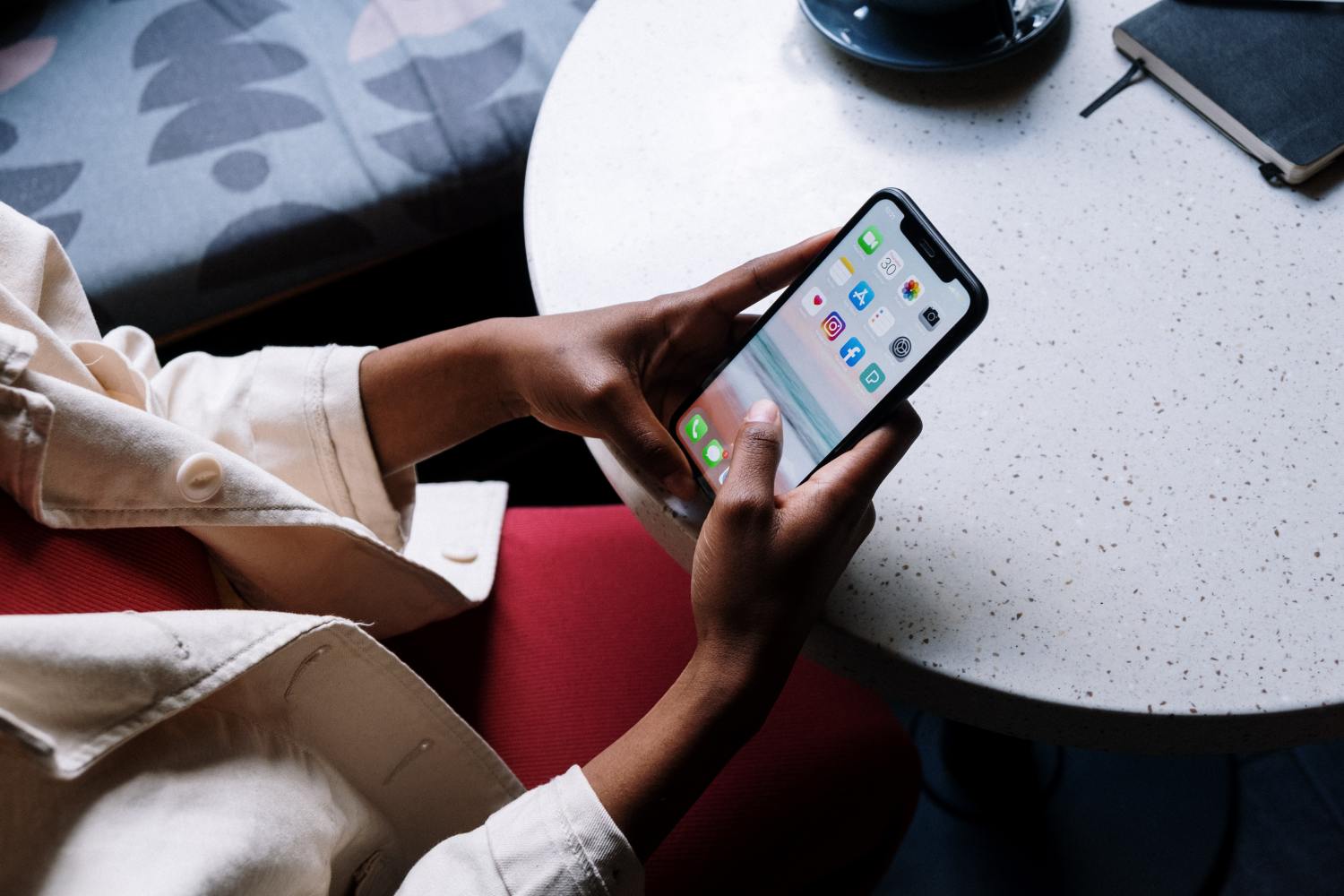 Person typing on a mobile phone