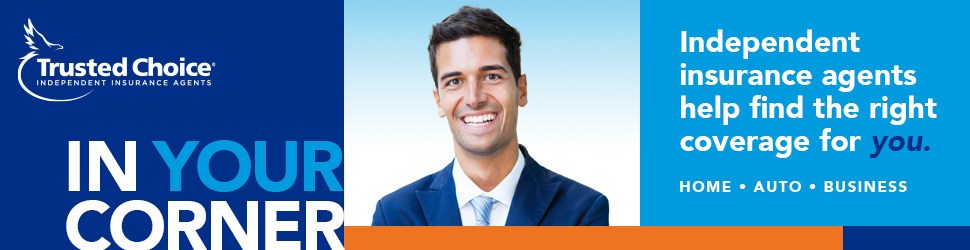 Image of man in a suit smiling